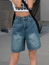 Vintage verwaschene blaue verkürzte Jeansshorts